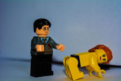 Close-up of yellow toy car on table