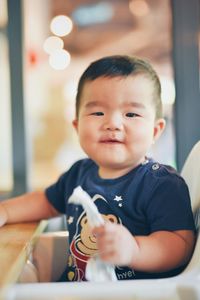 Close-up portrait of smiling boy