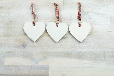 High angle view of heart shape on wooden table