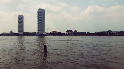 River by city against sky