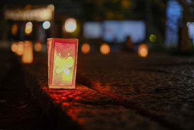 Close-up of illuminated candle