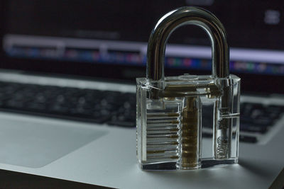 Close-up of padlock on keyboard