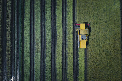 High angle view of agricultural machinery on field