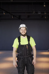 Smiling worker looking at camera