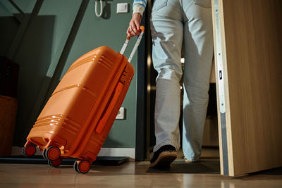 Low section of woman standing in store