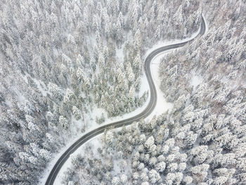 High angle view of snow covered mountain road