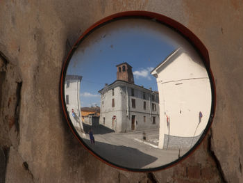 View of the road junction through the road mirror