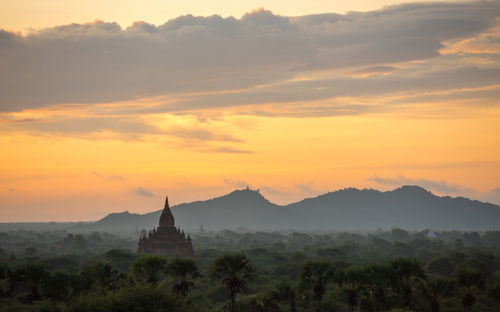 View of temple against sky during sunset