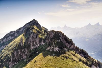 Scenic view of mountain range against sky