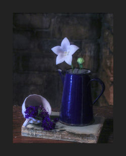 Close-up of flower pot on table