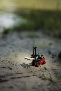 Toy car on sand