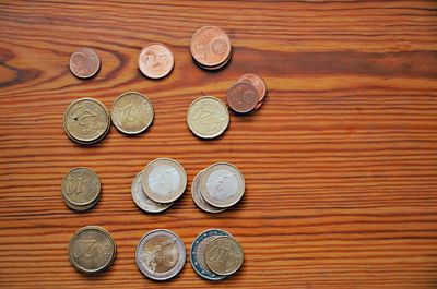 Directly above shot of coins on table