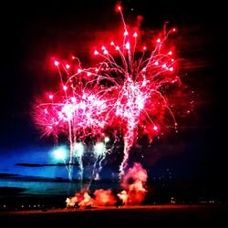 Low angle view of firework display