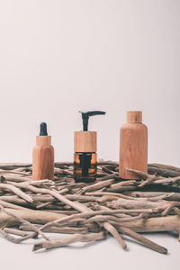 Close-up of stack on table against white background