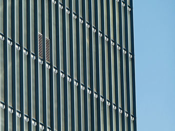 Low angle view of metallic structure against clear sky