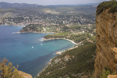 High angle view of city by sea