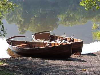 Boat moored in lake