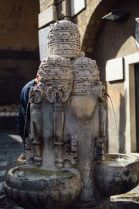 Close-up of statue against temple