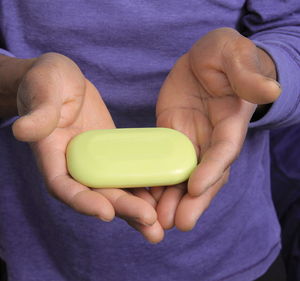 Close-up of man holding ice cream