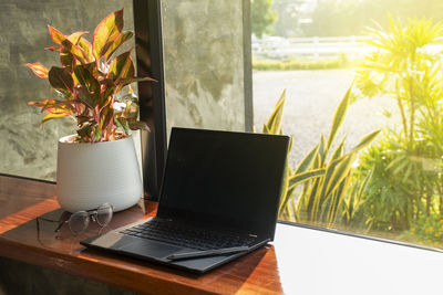 Close-up of laptop on table