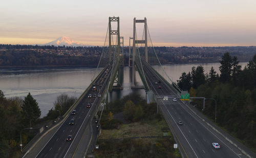 High angle view of bridge over river against sky during sunset