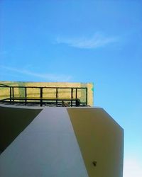 Low angle view of built structure against blue sky