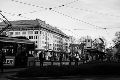 Group of people in front of buildings