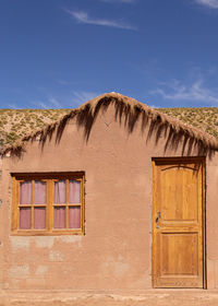 Color photography of house facade architecture in the atacama desert 