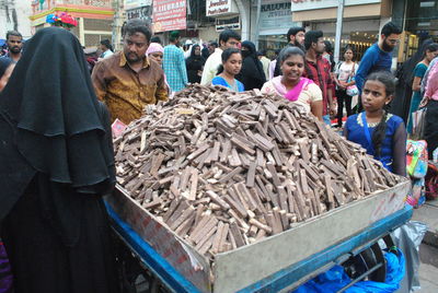 People standing on market stall