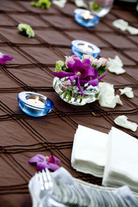 Close-up of purple flowers on table