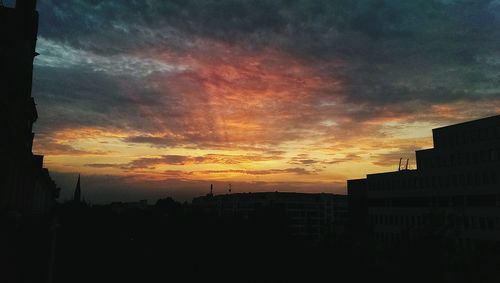 Scenic view of dramatic sky at sunset