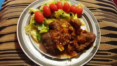 High angle view of chopped vegetables in bowl on table