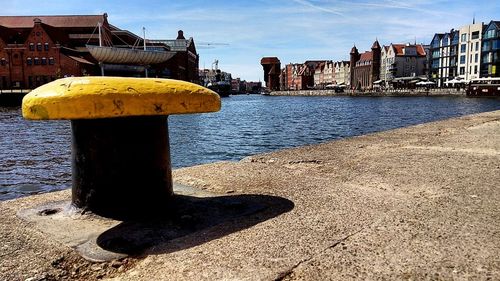 River against buildings in city