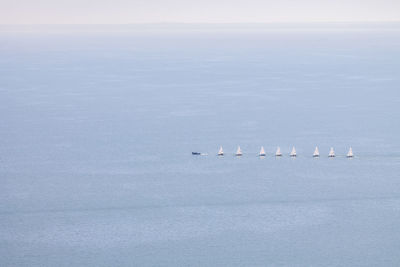 Scenic view of sea against sky during winter