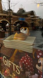 Blurred motion of people on street in city