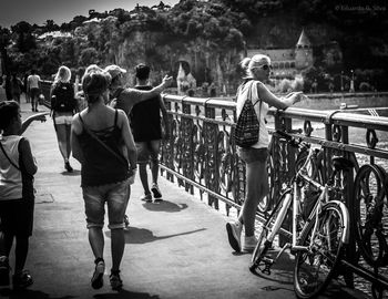 People on railing