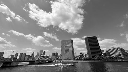 Modern buildings in city against sky