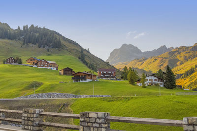 Scenic view of landscape and mountains against sky