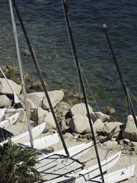 High angle view of rocks by sea