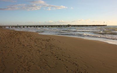 Scenic view of beach against sky