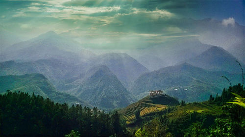 Panoramic view of landscape and mountains against sky