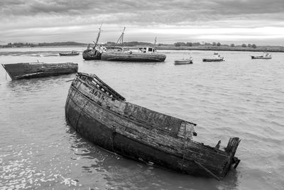 Boat in sea against sky