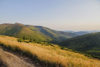 Scenic view of mountains against clear sky