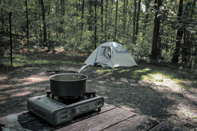 Black moshannon state park food is being cooked on a portable gas stove at a campsite.