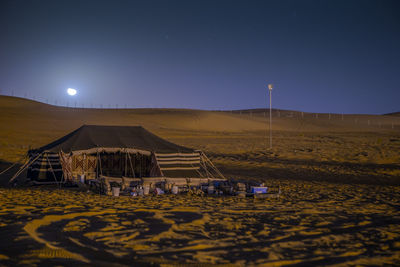 Scenic view of farm against sky at night