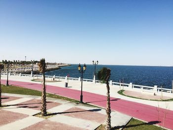 Scenic view of sea against clear blue sky