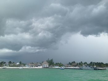 Scenic view of sea against cloudy sky