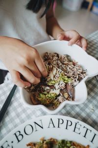 Midsection of woman holding food