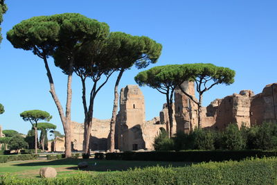 Low angle view of castle against clear blue sky