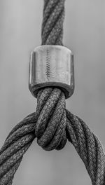 Close-up of rope tied to metal